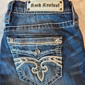 Rock Revival Distressed Blue Jeans with Embellished Pockets